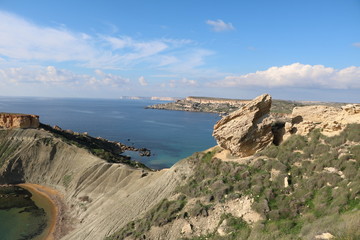 Fototapeta na wymiar Coastline of Ghajn Tuffieha Bay and Gnejna Bay in Malta 