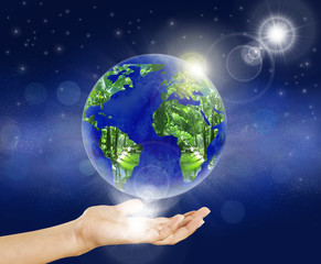 Earth globe hand sun