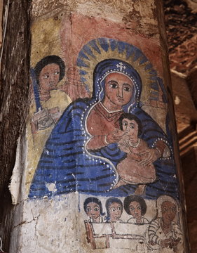 : iconographic scenes and wall murals of saints painted in naive african christian style in Abreha Atsbeha church 