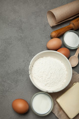 Ingredients for making dough for pizza or pasta, vertically.