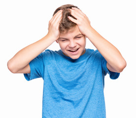 Emotional portrait of caucasian teen boy wearing blue t-shirt. Surprised or scared teenager. Handsome child, isolated on white background.