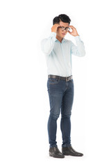 Full length portrait of young Asian man suffering from headache isolated on white