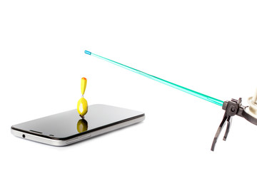 winter fishing rod with float in the smartphone screen. concept of waiting information