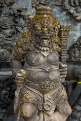 Fototapeta na wymiar Ancient Hindu God statue in Bali