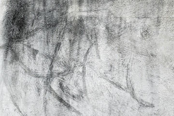 stained off-white plastered wall