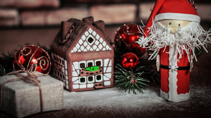 Christmas present on the background of a gingerbread house