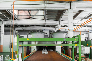 Conveyor of jugs at glass manufacture
