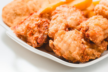 Chicken nuggets on white background