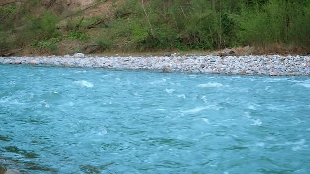 Clean Mountain River With a Strong Current Flows Rapidly From the Mountains of the Caucasus. Evening