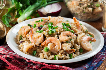 Fried rice with shrimp and vegetables served on a plate