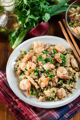 Fried rice with shrimp and vegetables served on a plate
