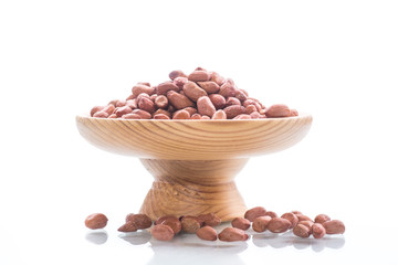 peanut in wooden bowl