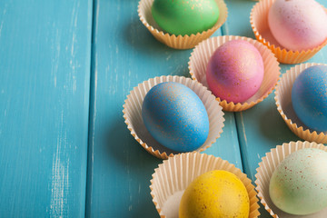 Easter background. Colored eggs closeup