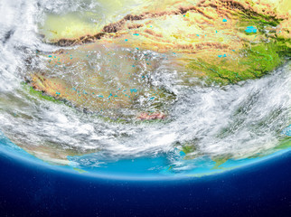 Bhutan on globe from space
