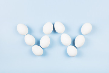 White eggs in form of letter 