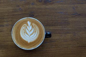 hot latte on table for working day