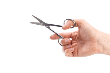 Female hand holding scissors, isolated on white background
