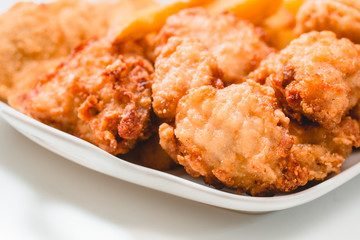 Chicken nuggets on white background