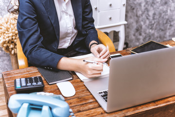 Business women of economists working with financial charts. Workplace strategy Concept.