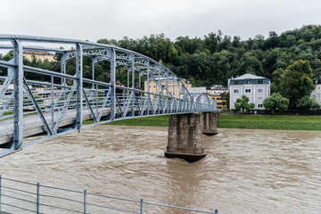 Steel bridge over river in Salzburg