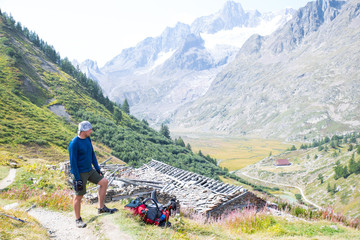 expedition to mountains with a tent and solar batteries
