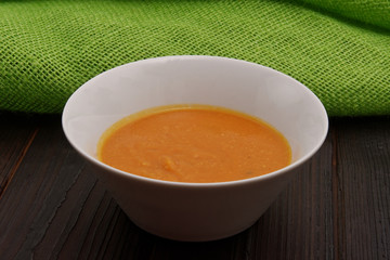 Cicer creme soup on a wooden table