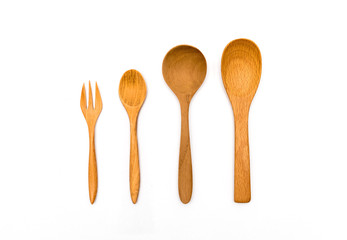 Set of wooden spoon and wooden fork isolated on white background.