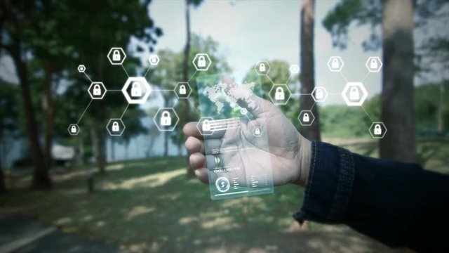 Hand of woman holding clear hologram with user interface and hexagon shape lock icon for network security padlock cyber futuristic technology concept