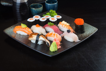 japanese cuisine. sushi set on the background