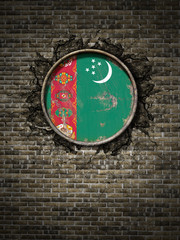 Old Turkmenistan flag in brick wall