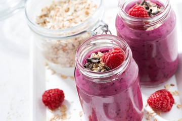 healthy raspberry smoothie with oatmeal, top view