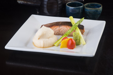 japanese cuisine. fried fish on the background
