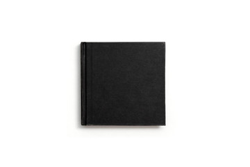Black notebook isolated on white background.