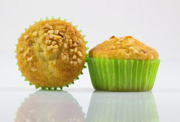 Close up muffin, cupcake,banana cake with dried nuts Isolated on white background.