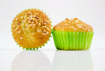 Close up muffin, cupcake,banana cake with dried nuts Isolated on white background.