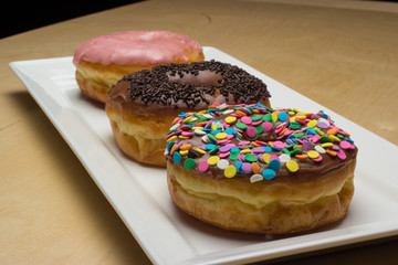 fresh donuts on a plate