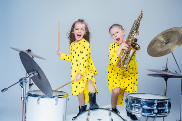 The teen music band performing in a recording studio