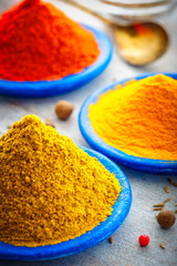 Wooden table of colorful spices