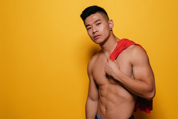 Portrait of young asian boy with fitness body.