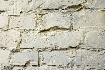 Yellow brick wall texture closeup