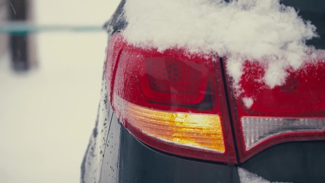 day. car Blinker light. emergency flashing lamp car during a snowfall 4k.