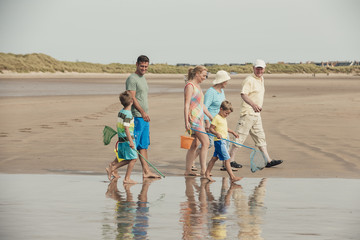 Family Walking to the Sea Front