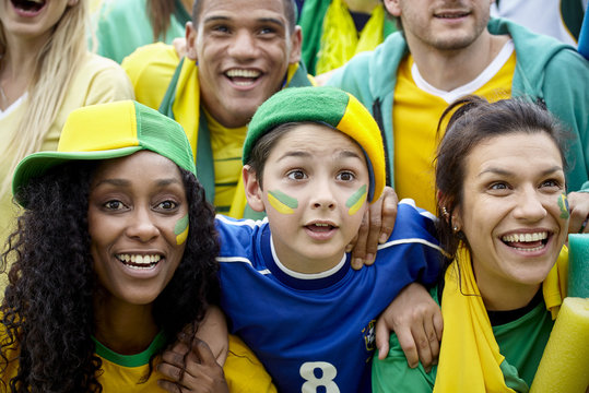 Brazilian football fans watching football match