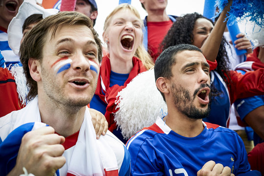 French football fans watching football match