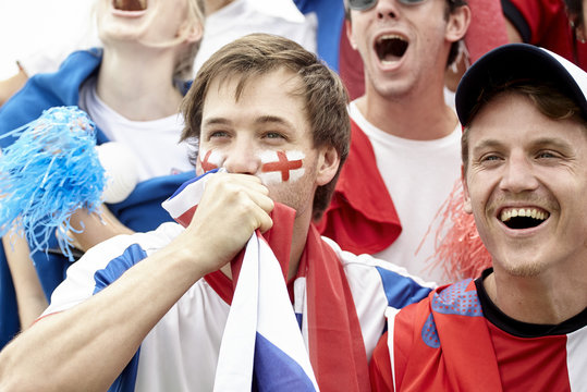 British football fans having fun at match