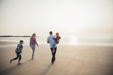 Family Walking at the Beach