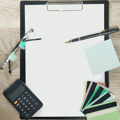 financial schedule and discount cards in the workplace of the businessman