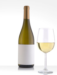 Isolated White Wine Bottle in a White Background and Glass