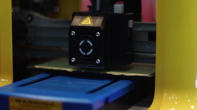 A revolutionary technology,a diy home made three dimensional printer, printing a plastic object made out of biodegreadable disposable plastic filament.