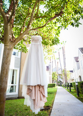wedding dress hanging 